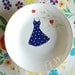 Polkadot dress in the apple tree plate