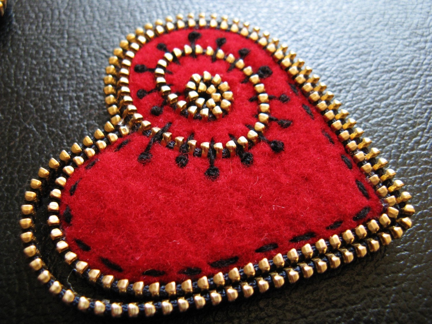 Red felt and zipper heart brooch