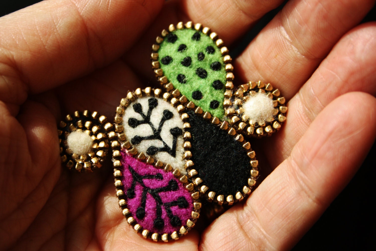Felt and zipper squiggle brooch