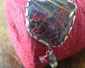 Recycled tins Brooch. Handwritten darkly.