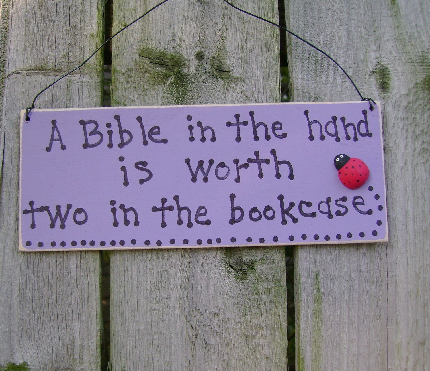 A Bible in the hand...Christian Sign