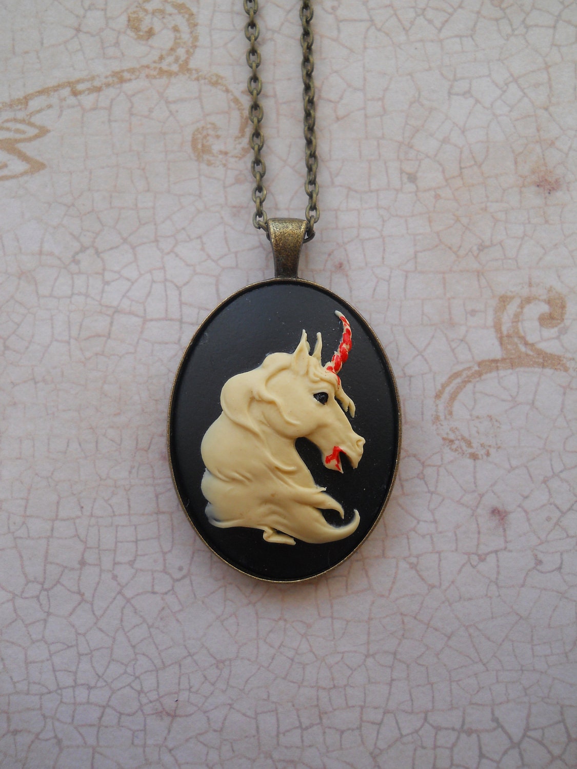 Battle torn unicorn necklace
