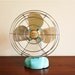 Refurbished vintage electric Wizard fan in aqua blue