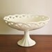 Vintage large milk glass pedestal bowl with a lattice edge