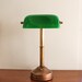 Antique brass bankers lamp with green glass shade, General Electric
