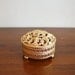 Vintage gold jewelry box with greek key