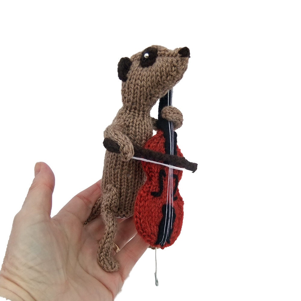 Meerkat cellist, musican meercat, animal playing cello, orchestra, band, knitted celloist