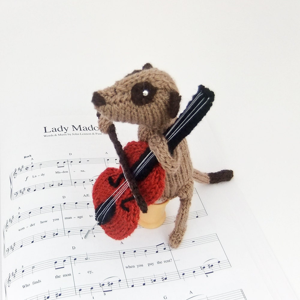 Meerkat cellist, musican meercat, animal playing cello, orchestra, band, knitted celloist