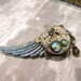Steampunk Wing Brooch - a wing of steampunk exclusive original design of Days Long Gone