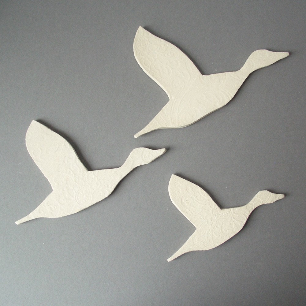 Flock ceramic wall art set of three flying ducks sizes C D and E