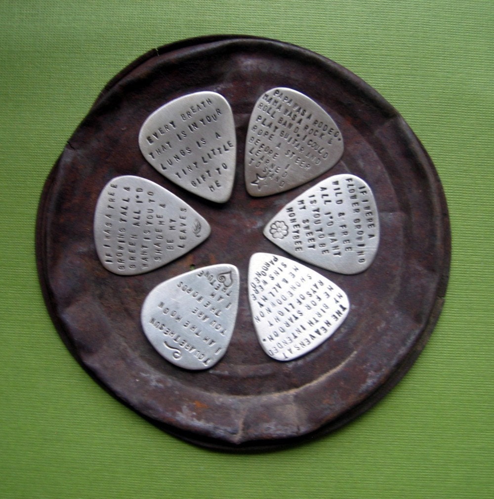 custom silver guitar pick