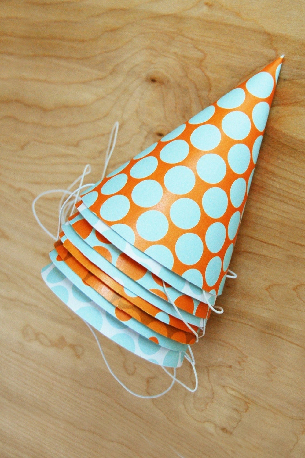 party hats. light blue and orange