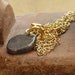 Oxidized silver pendant woth a gold necklace Black Organic pendant hung from gold chain