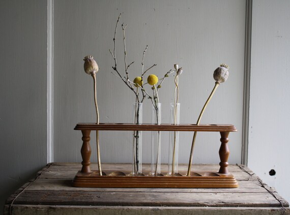 vintage wooden rack with test tubes
