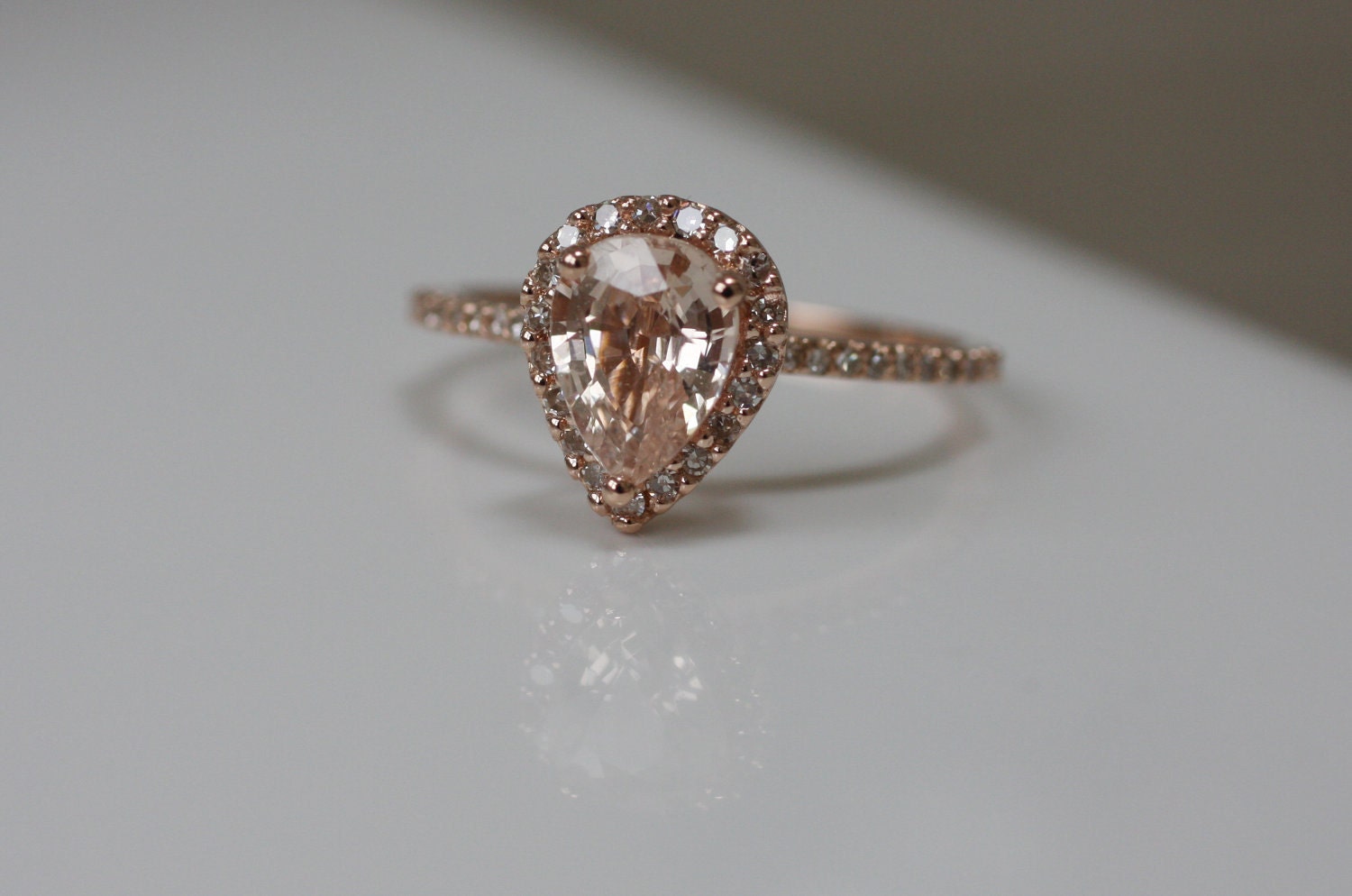 Peach champagne tear drop sapphire and rose gold diamond ring