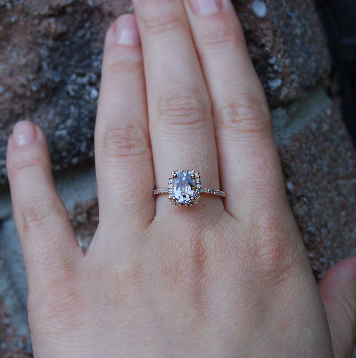 Cushion 14k rose gold diamond ring with a color change sapphire