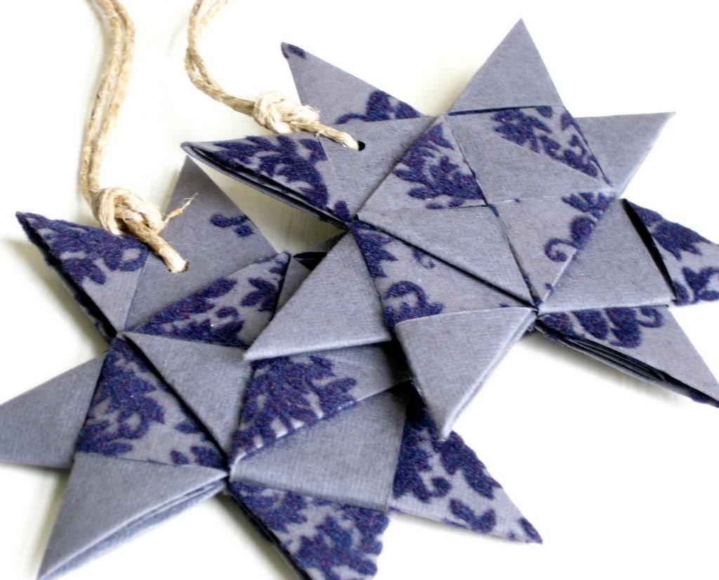 Star ornament origami folded textured dark blue