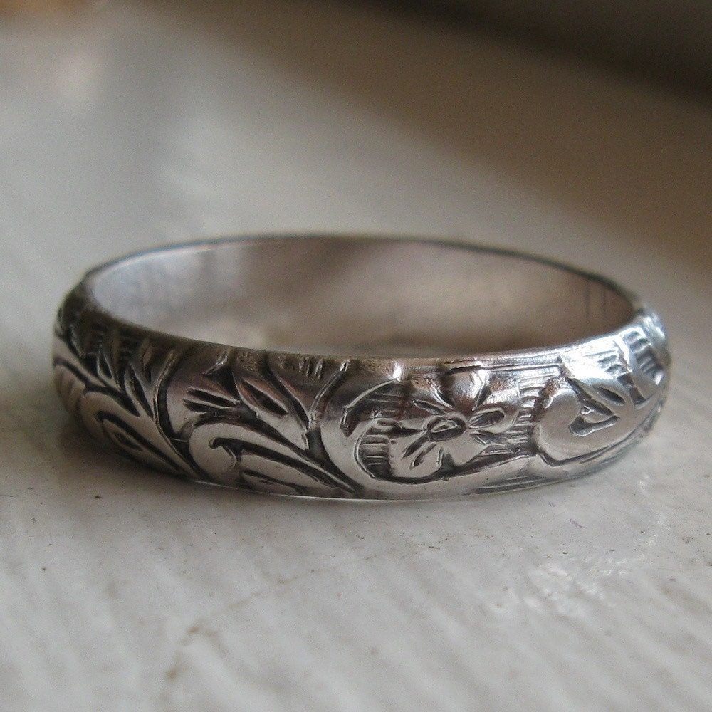 Rustic sterling renaissance wedding band