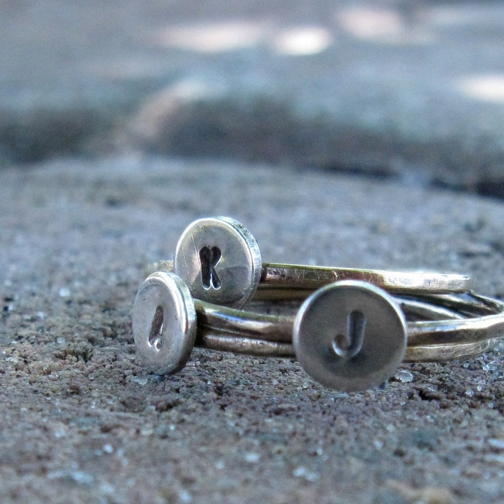 Solid gold and sterling initial rings
