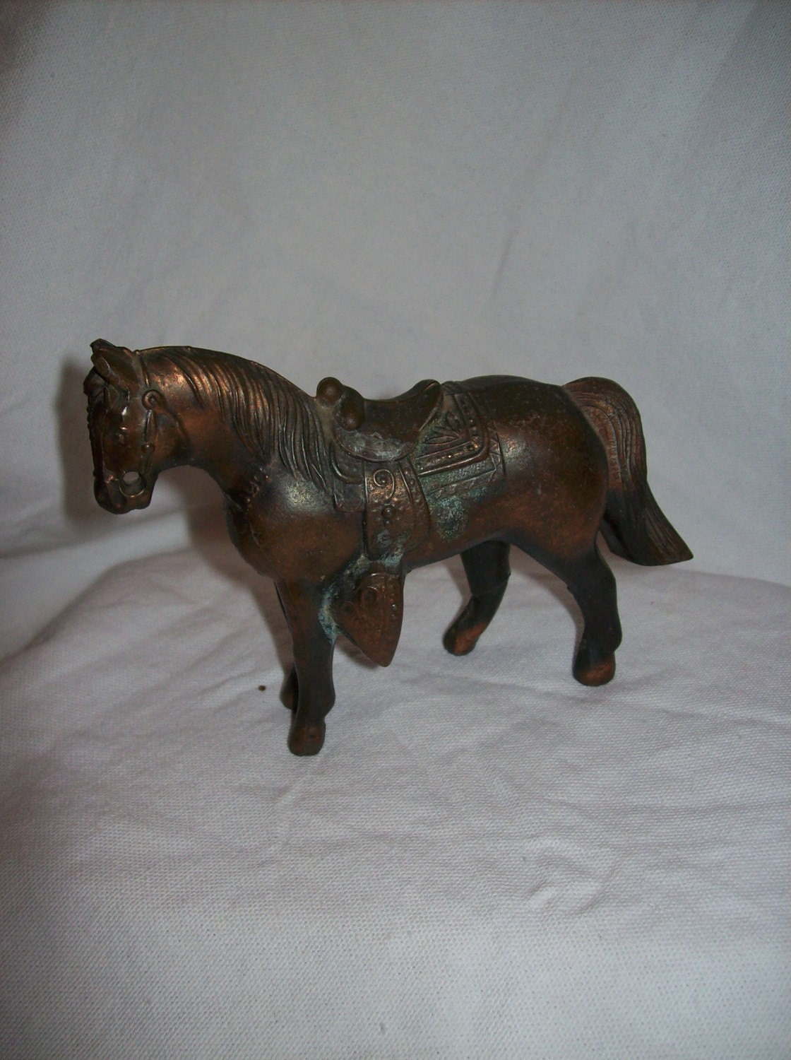 old metal horse figurines