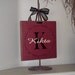 Families are Forever vinyl lettering circle, with your personalized monogram initial and family name on a board w/ribbon