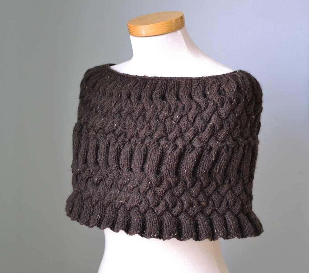 Brown knitted capelet with braids G670
