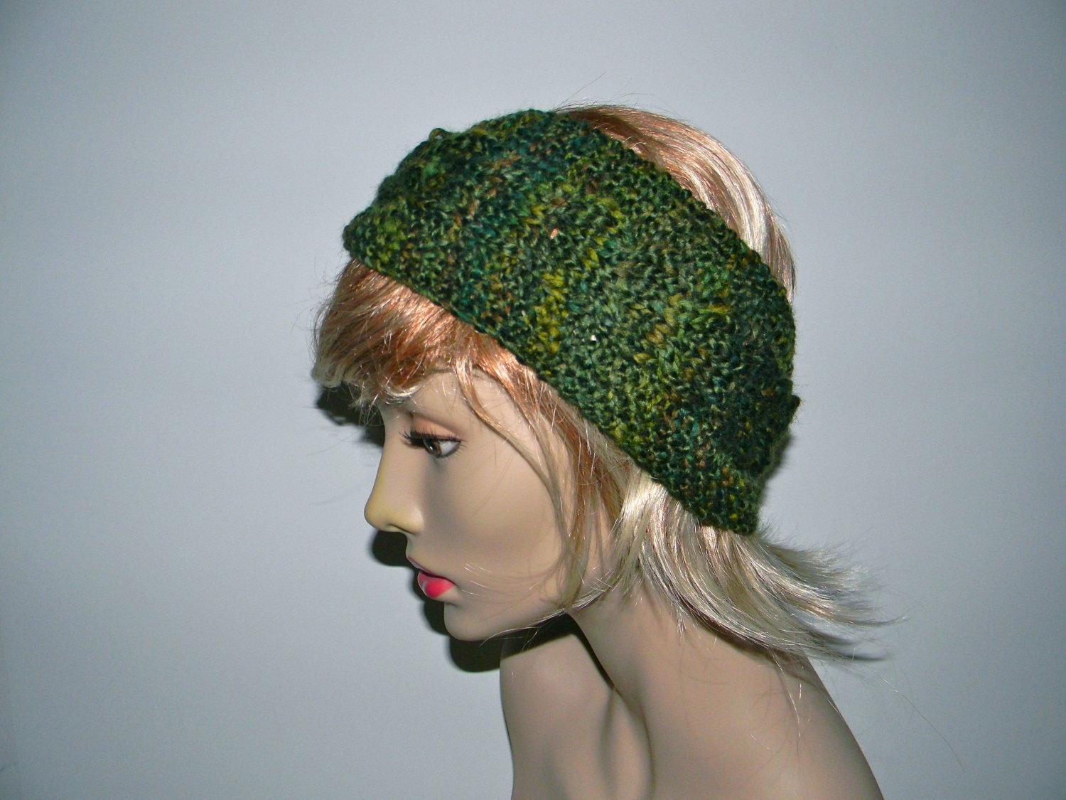 Knitted  headband, head band, hair band, ear warmer in green with a cable pattern - free shipping worldwide