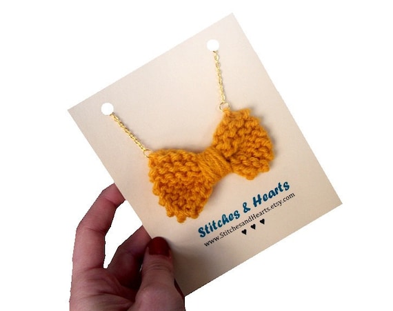 Knit Bow Necklace - hand knitted mustard yellow bow on gold chain