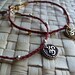 Red Om (silver or gold) bracelet