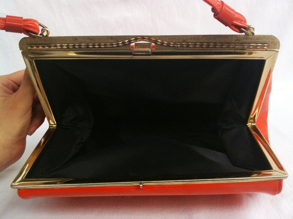 Unique shiny orange patent vinyl frame style handbag with black satin lining and gold clasp, vintage 1960's  - Free Shipping