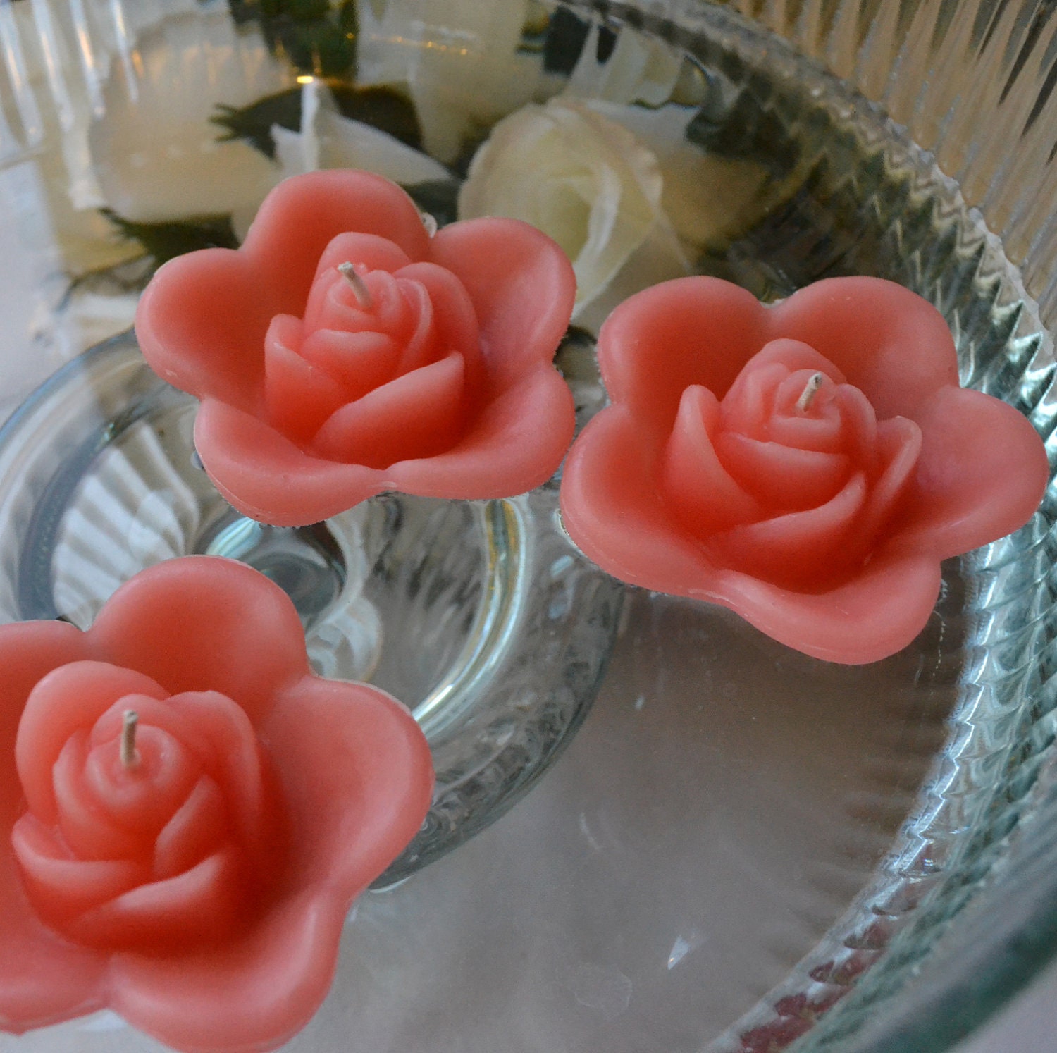 12 Coral Reef floating rose wedding candles for table centerpiece and reception decor.