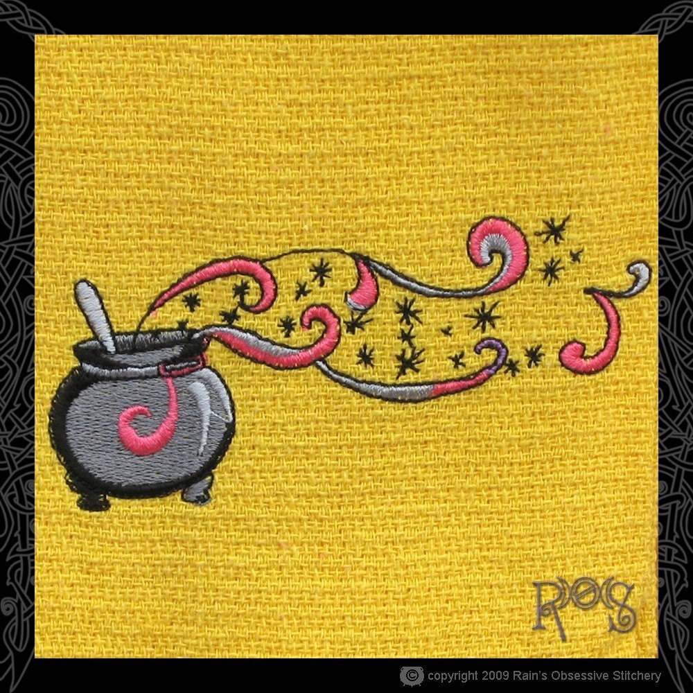 Yellow Tea Towel Embroidered with Cauldron