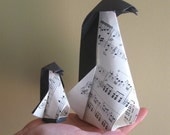 A Set Of A Large And A Little Origami Musical Penguins