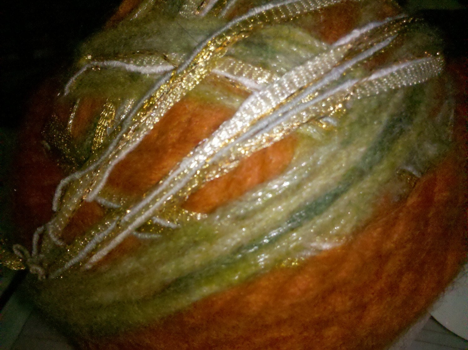 green, gold and orange HAND TIED yarn ball