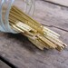 vintage c. 1960s set of 25 gold metal arrow cocktail picks // made in England (LAST SET)