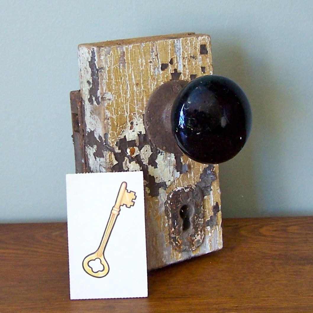Vintage skeleton key lock set with two knobs one black, one brown