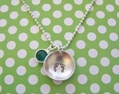 sterling silver baby feet necklace with birthstone
