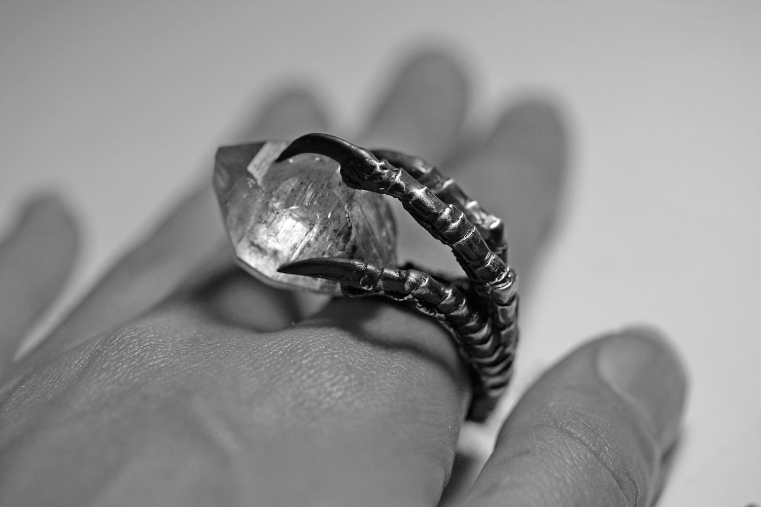 the messenger. crow claw & quartz crystal ring. sterling silver.
