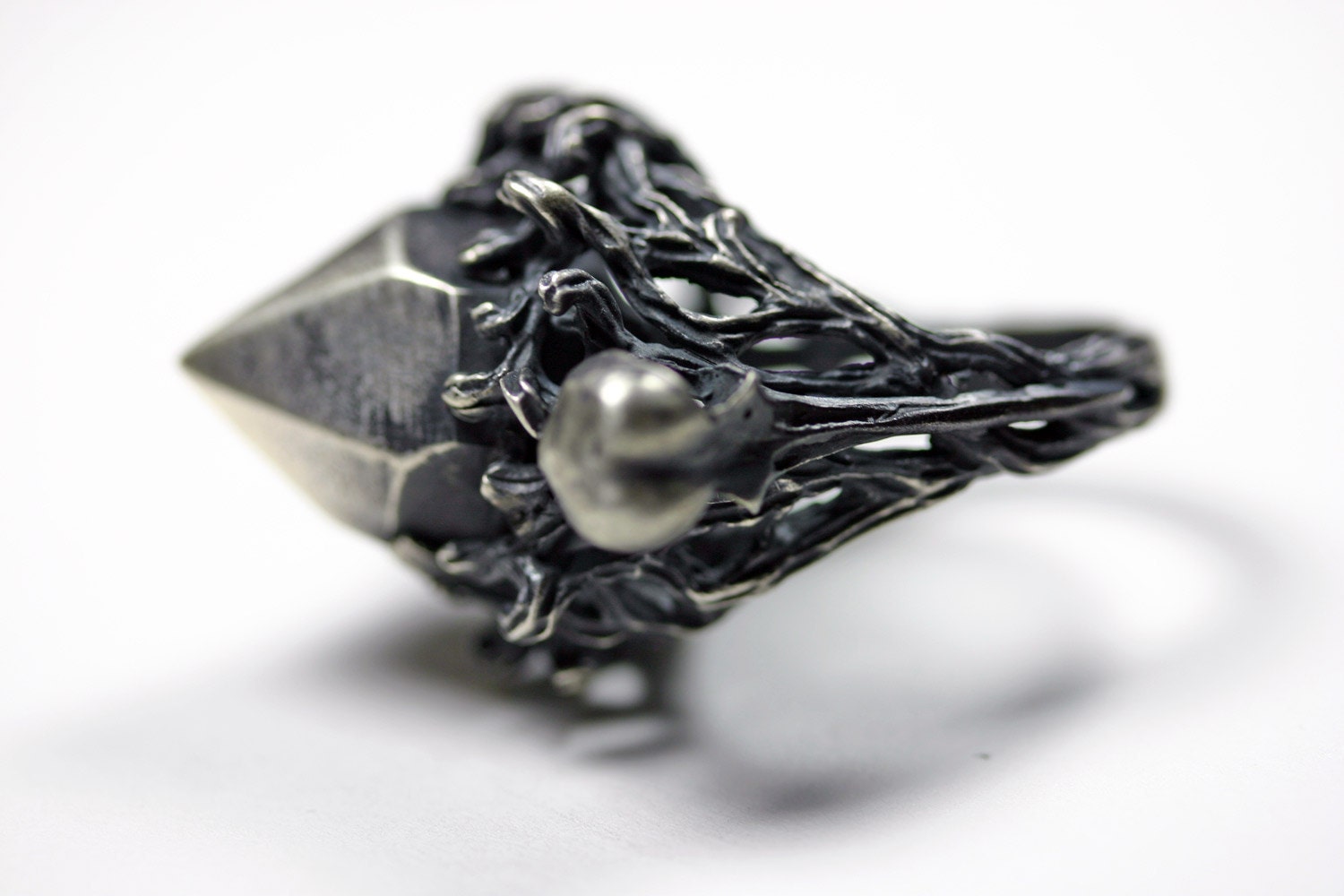 nesting in the underworld. cast crystal and hummingbird skull ring.