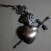 8 of swords. sterling tarot necklace.