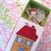 Mini camille doll in her little house