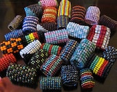 buy 1 get 1 free offer on custom beaded dread cuffs/beads