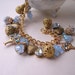 spring jewelry Shabby charm bracelet with vintage baby blue glass and filigree