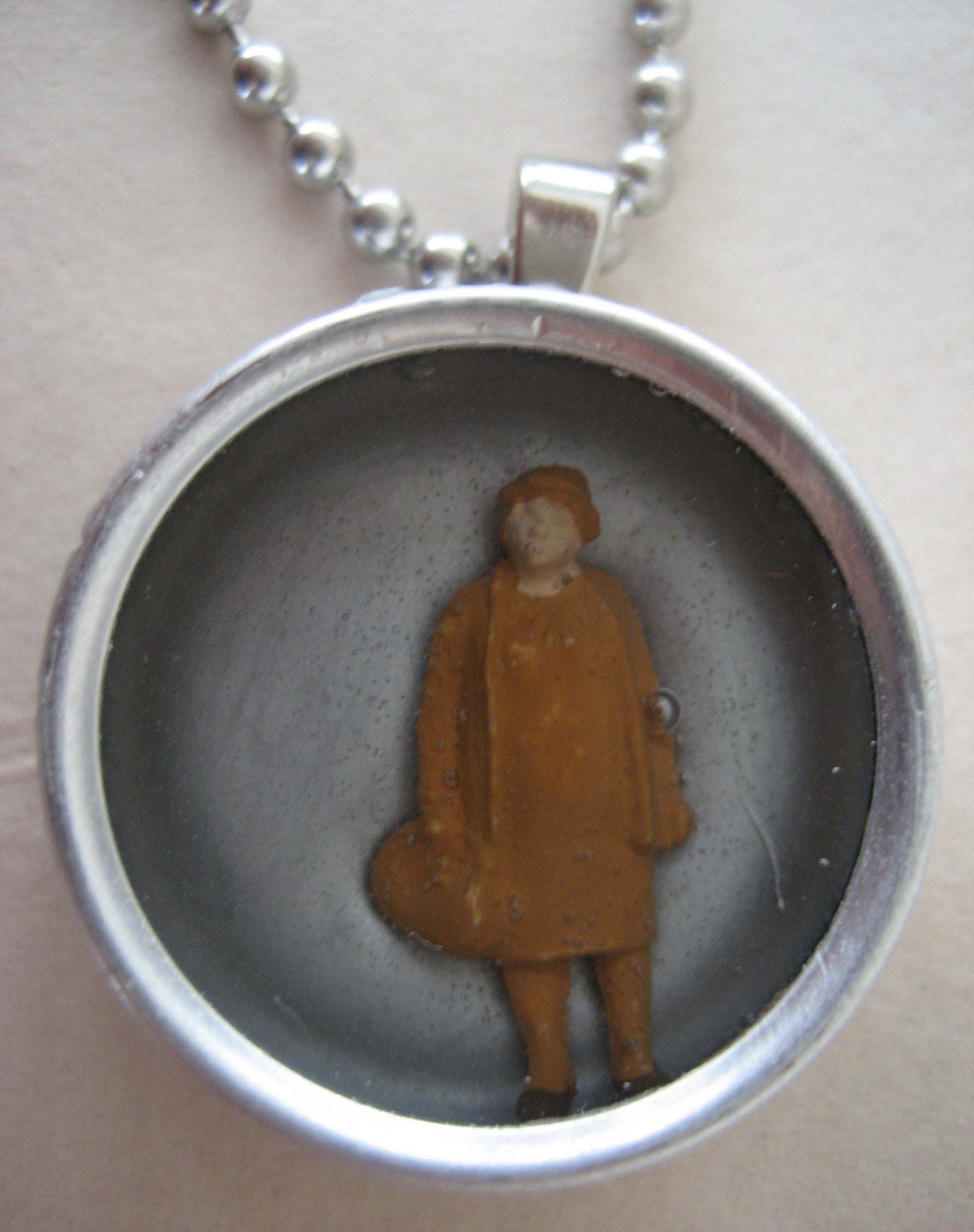Woman in Brown Necklace