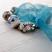 Cherry blossom bracelet - porcelain beaded with teal chiffon ribbon