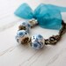 Cherry blossom bracelet - porcelain beaded with teal chiffon ribbon