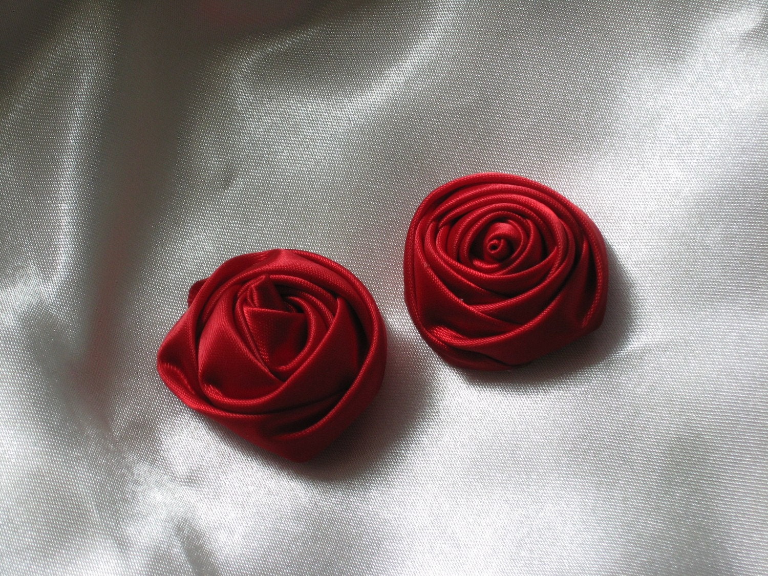 2 red satin roses --1