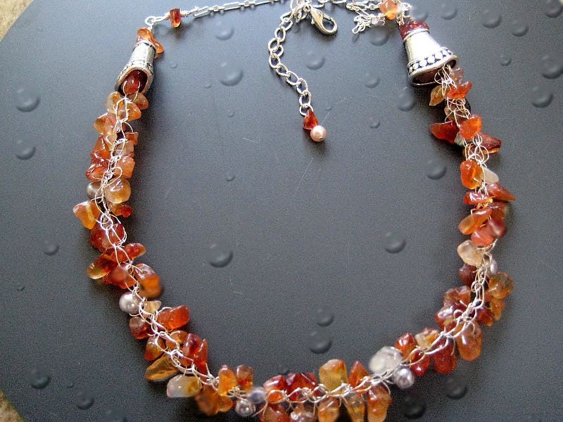 Burgundy and red, wine and orange gemstones  wrapped in  knitted  sterling silver wire necklace