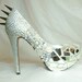 Cinderella's Revenge...Swarovski crystals, broken shards of glass and spikes