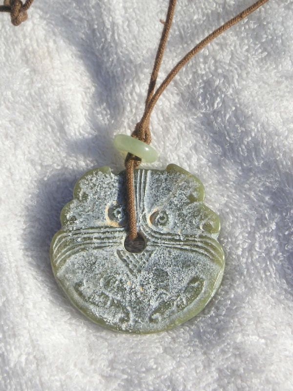 Vintage Carved Jade Stone Face Pendant Necklace by acrazeelady